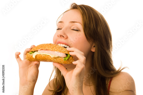 young woman eating a hot-dog