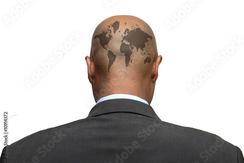 Businessman back iwith world map photo
