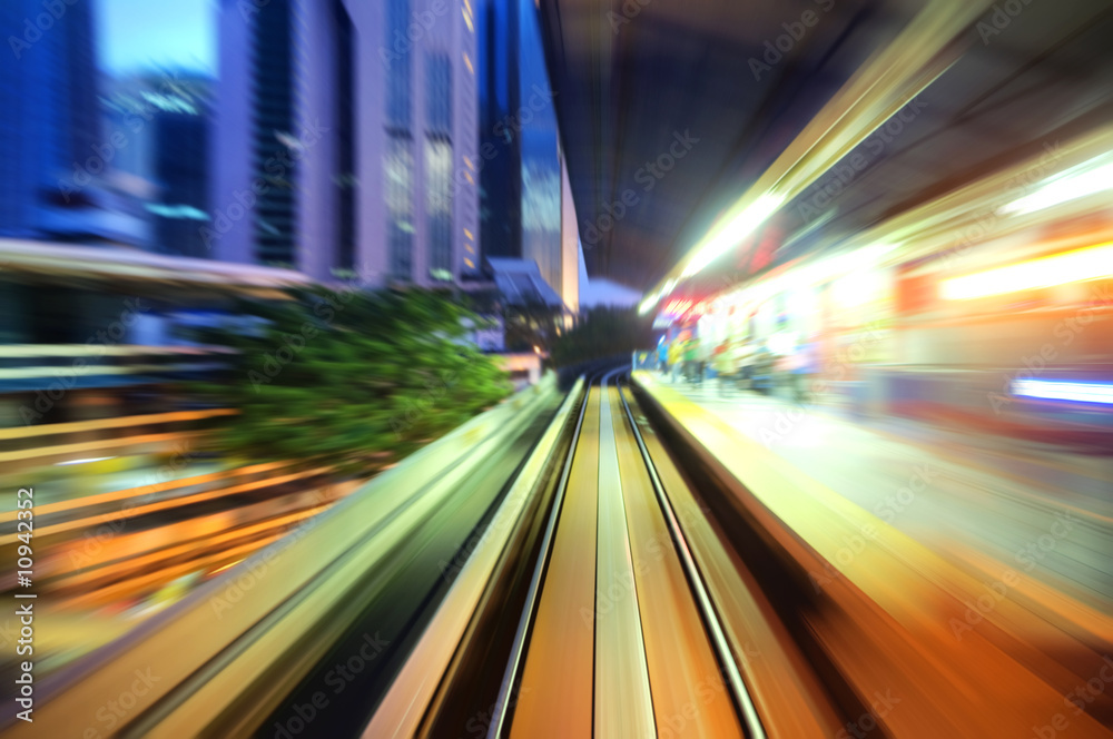 Speedy trains passing train station. Focus on the rail road. Speedy trains passing train station. Focus on the rail road.