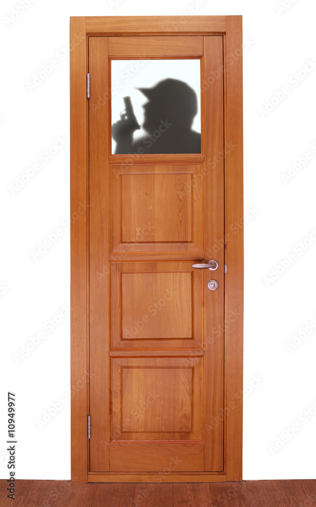 shade of stranger on the window of door from a dark tree shade of stranger on the window of door from a dark tree