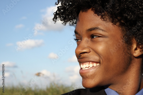Headshot of a smiling man