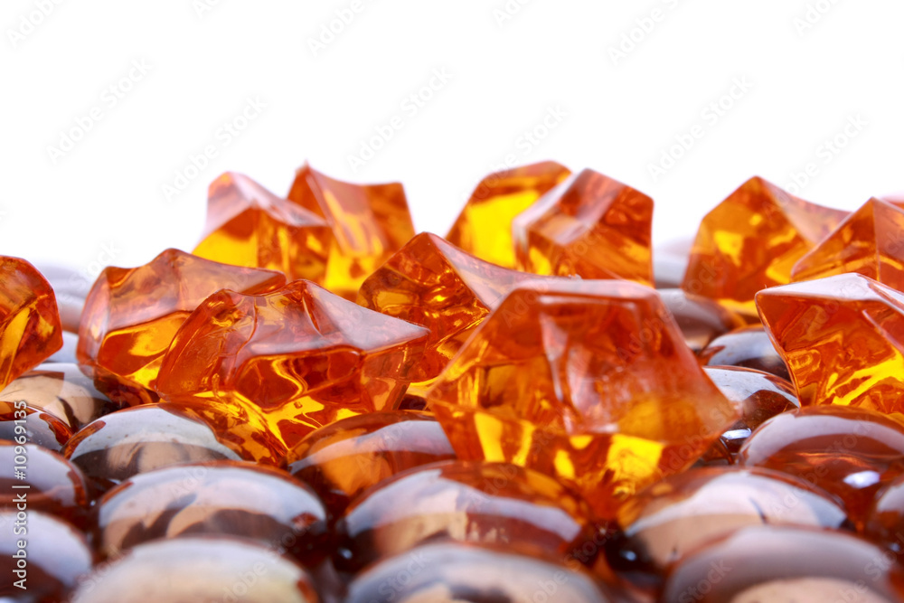 brown shiny stones and gems on white background brown shiny stones and gems on white background