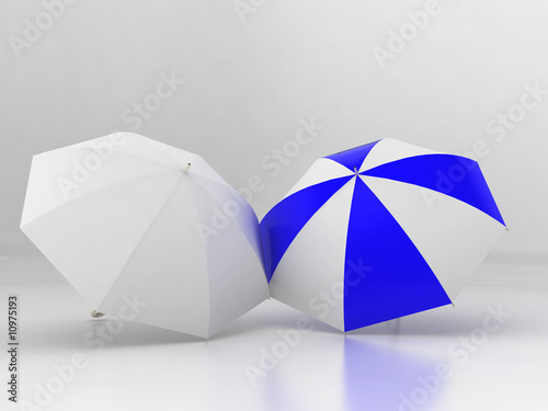 two umbrellas on white background © Pulsar75
