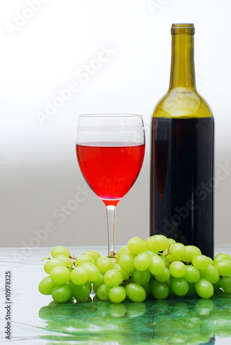 Red Wine with a bottle and grapes