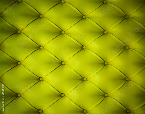 Green button-tufted leather background