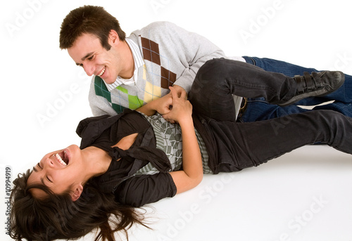 фотографія Young Girl being Tickled by Young Man