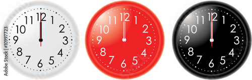 Different colors clocks  with hands on 12 o'clock