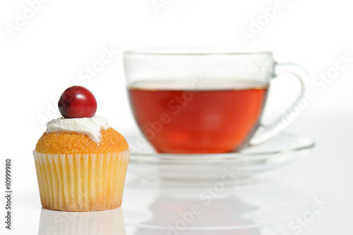 Still life with cup of tea and muffin