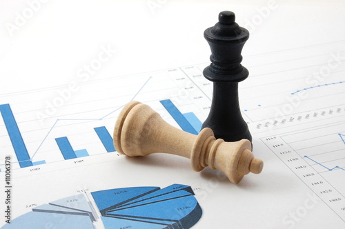 chess man over business chart photo