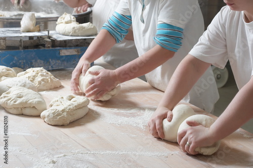 Preparing bread © georgemuresan
