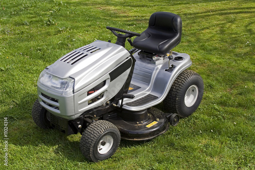 Small tractor for cutting lawn.