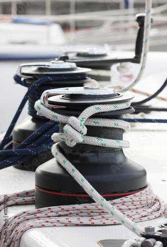 Winches with ropes on a sailing boat.