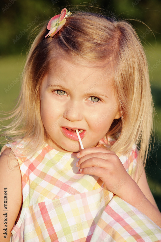 lpretty little blond girl with lollipop lpretty little blond girl with lollipop