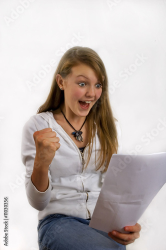 Girl with surprised and happy facial expression photo