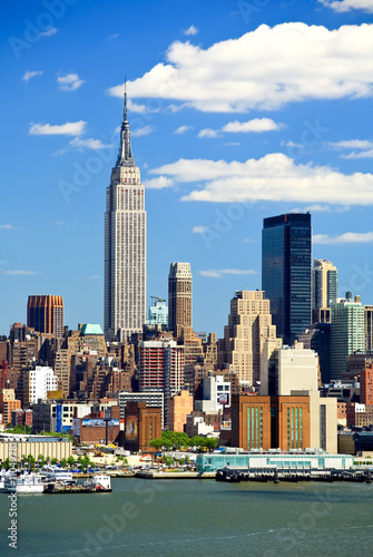 The Mid-town Manhattan Skyline on a sunny day #11049781