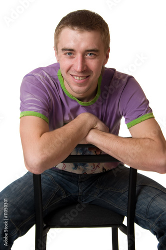 Man sit on chair.