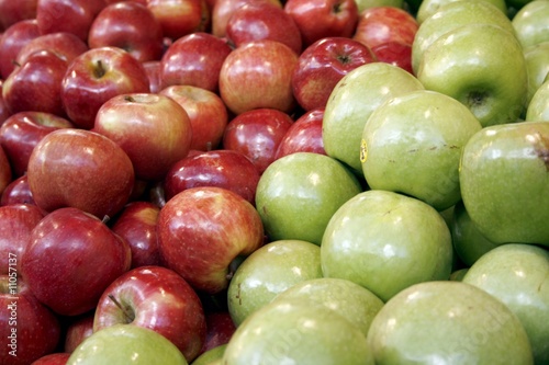 Green and Red apples on the market