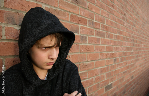 Boy in hooded top
