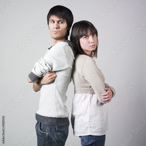 Fototapet A young couple arguing back to back
