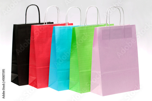 Five paper shopping bags at an angle