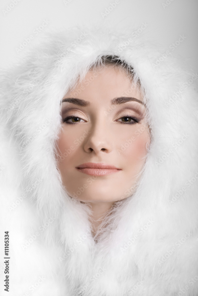 winter girl with a fur hat on