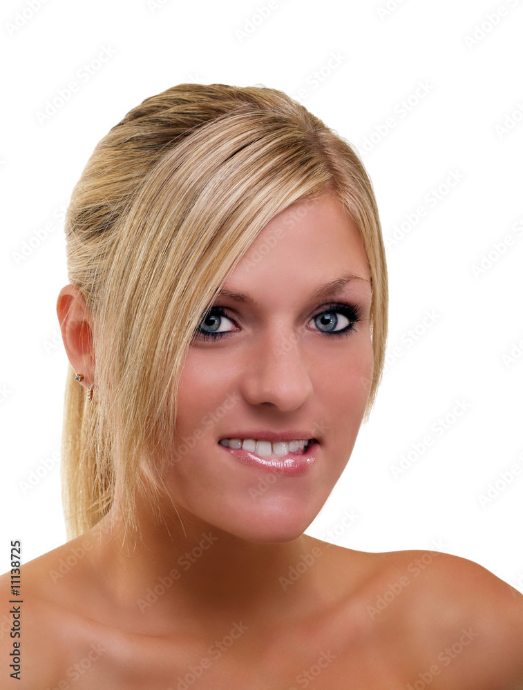 Young blond woman portrait biting lower lip Young blond woman portrait biting lower lip