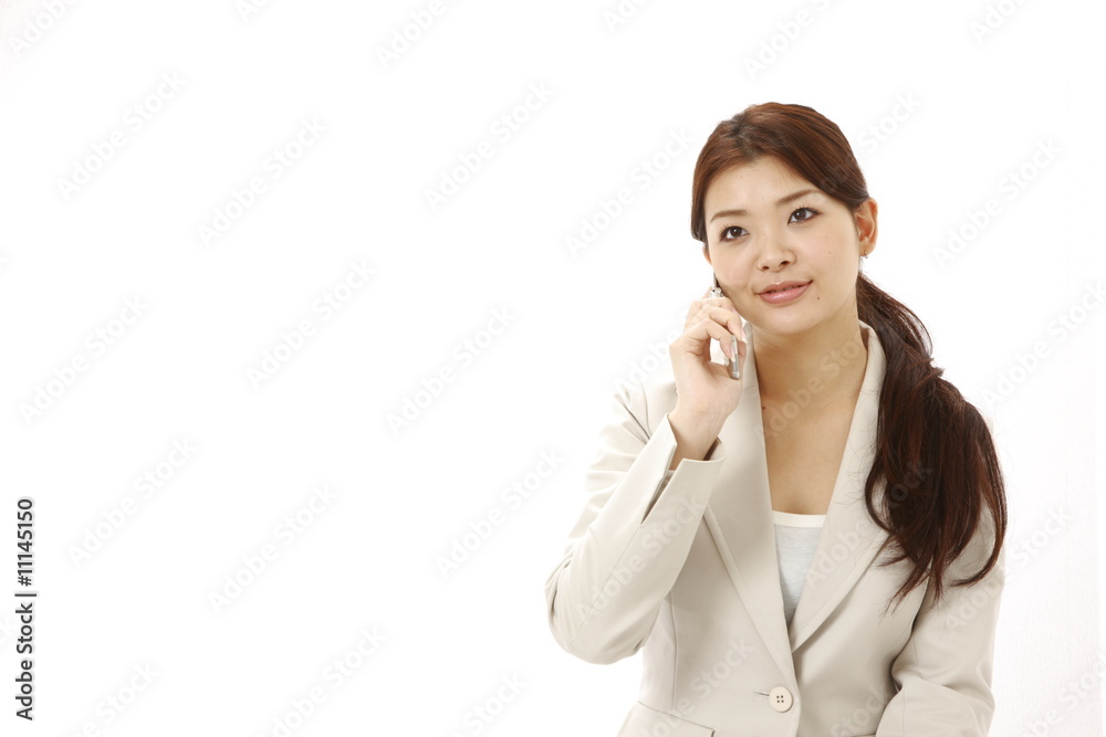 businesswoman talks with a mobile phone businesswoman talks with a mobile phone