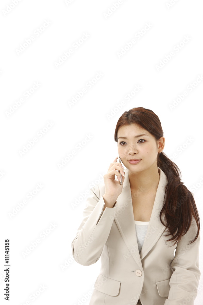 businesswoman talks with a mobile phone businesswoman talks with a mobile phone