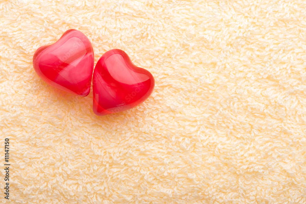 Fototapeta premium two red hearts on terry towel
