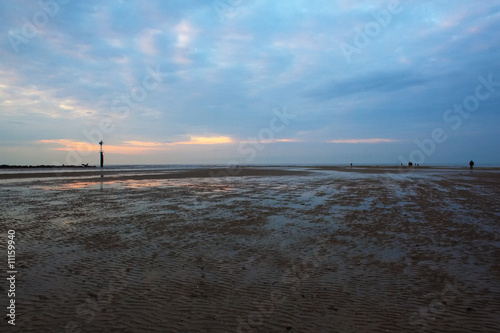 Sunset in trouville beach photo