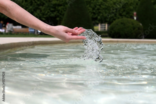 Hand dancing with the water photo