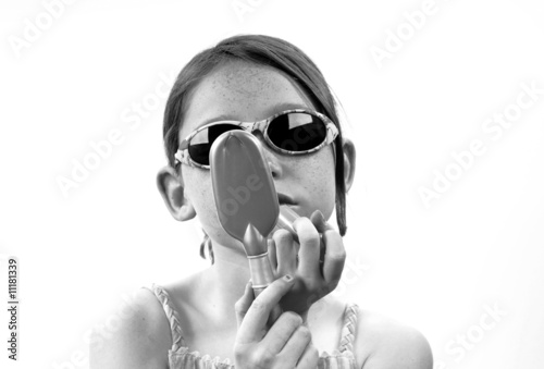 Young girl and mirror photo