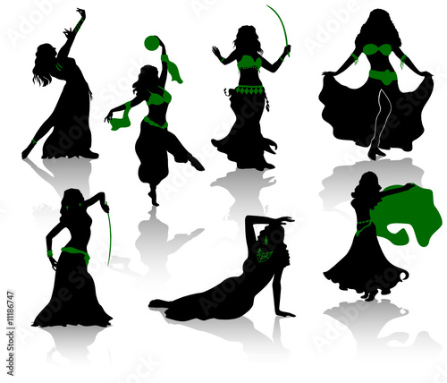 Belly dance. Silhouettes of beauty dancers.