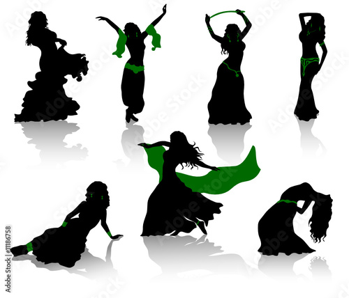 Belly dance. Silhouettes of beauty dancers.