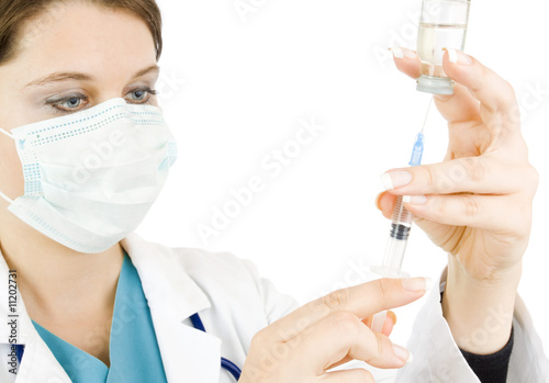 doctor holding syringe and getting ready for injection