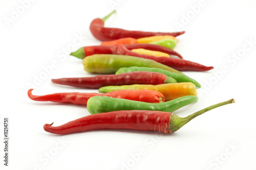 colorful hot peppers in a row