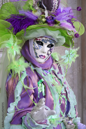 Venice carnival. Mask on the street photo