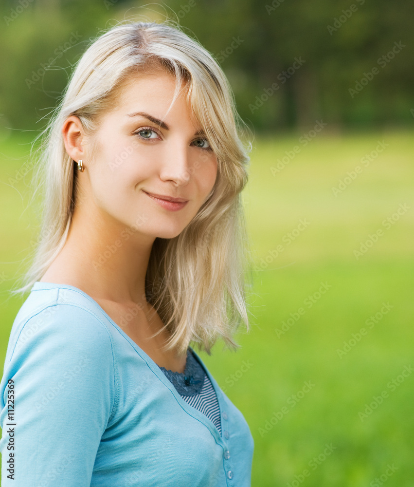 Fototapeta premium Beautiful blond woman outdoors