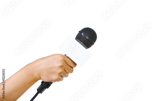 Bare hand holding microphone