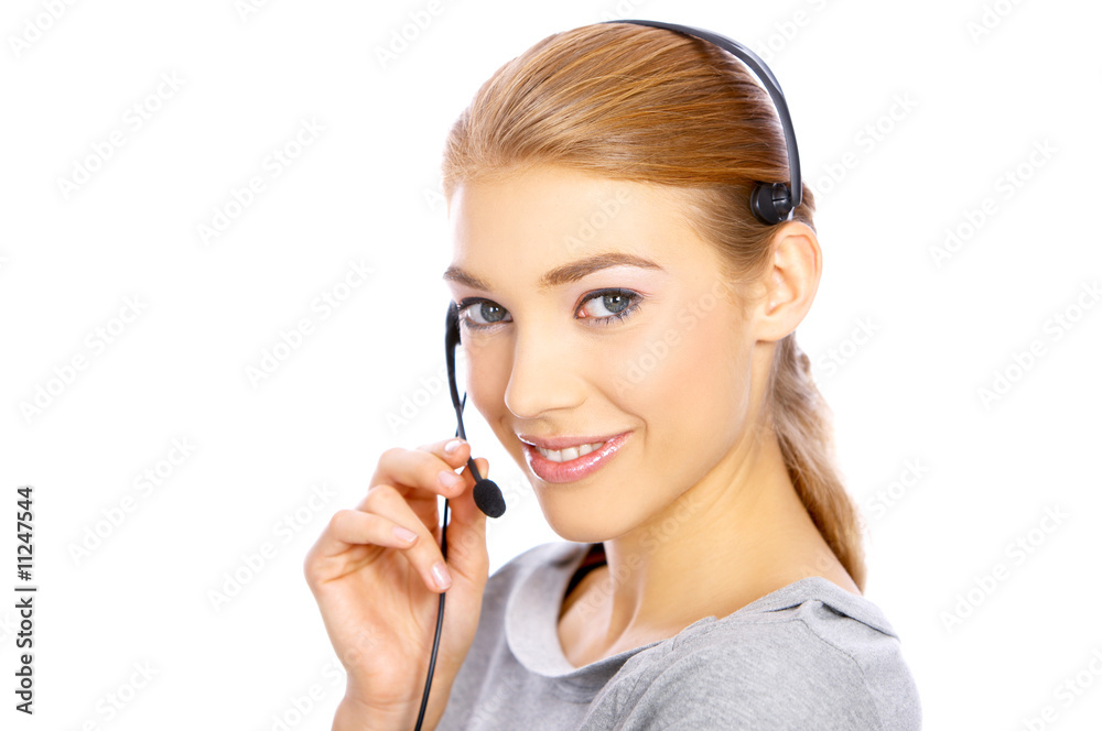 Beautiful girl is using headset, she isolated on white Beautiful girl is using headset, she isolated on white