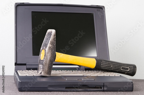 Computer and hammer