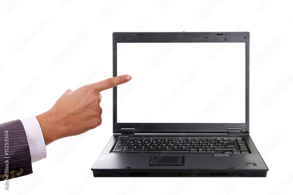 hand pointing to a laptop screen over white background hand pointing to a laptop screen over white background