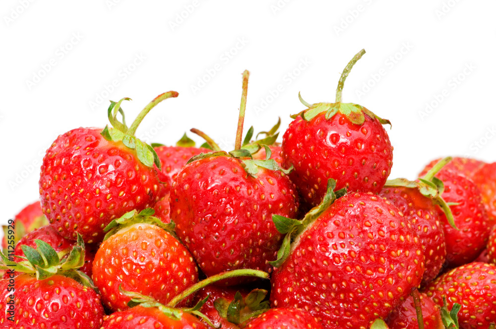 Red strawberries isolated on the white background Red strawberries isolated on the white background