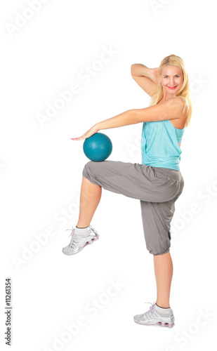 Woman practises with a blue ball