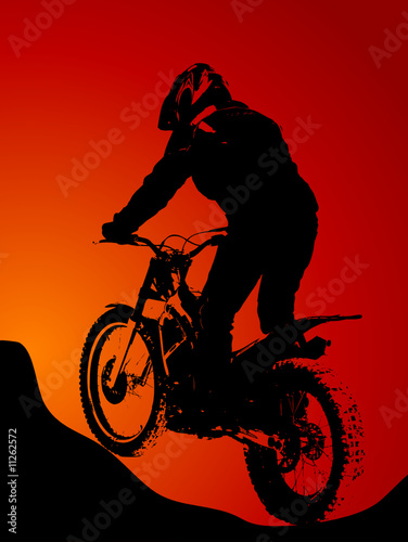 Silhouette of motobiker in the sunset
