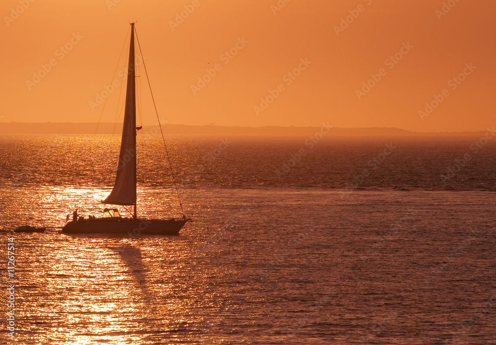 Sailboat in Red Sunset