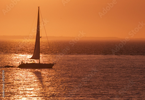 Sailboat in Red Sunset