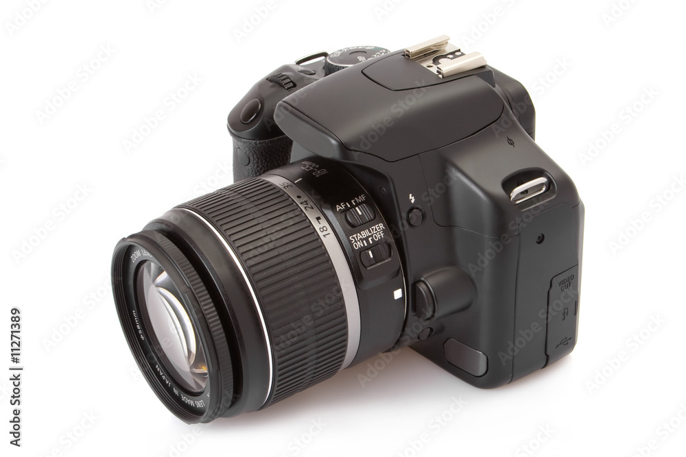 Digital slr isolated on a white background.. Digital slr isolated on a white background..