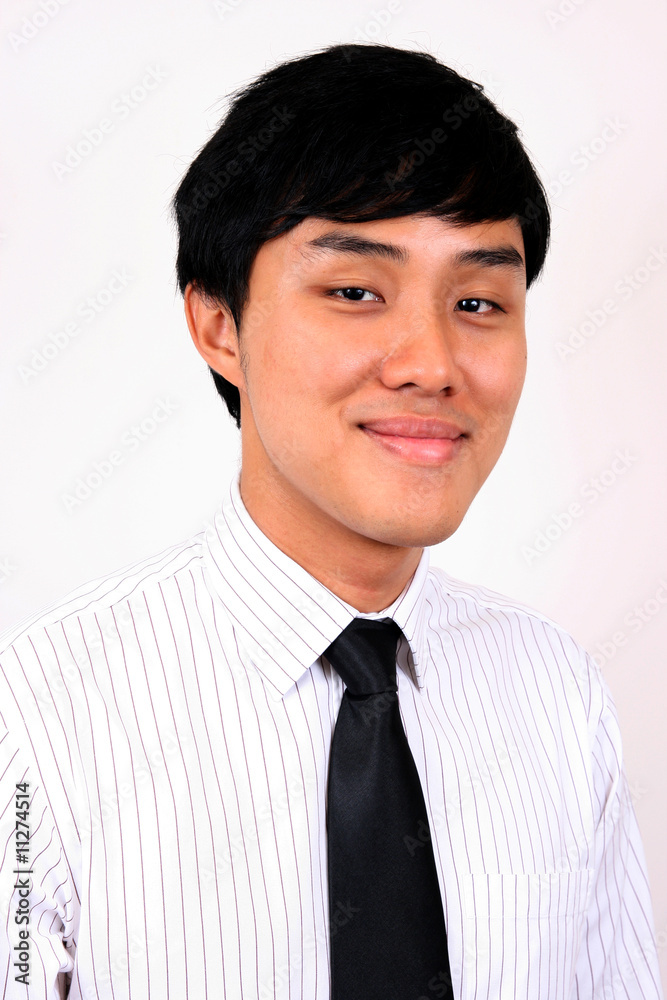 Young and confident Asian business man. Young and confident Asian business man.