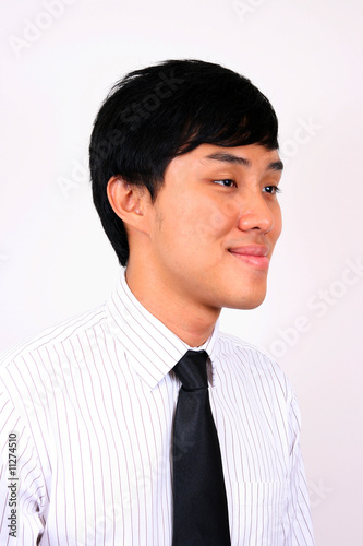 Young and confident Asian business man.